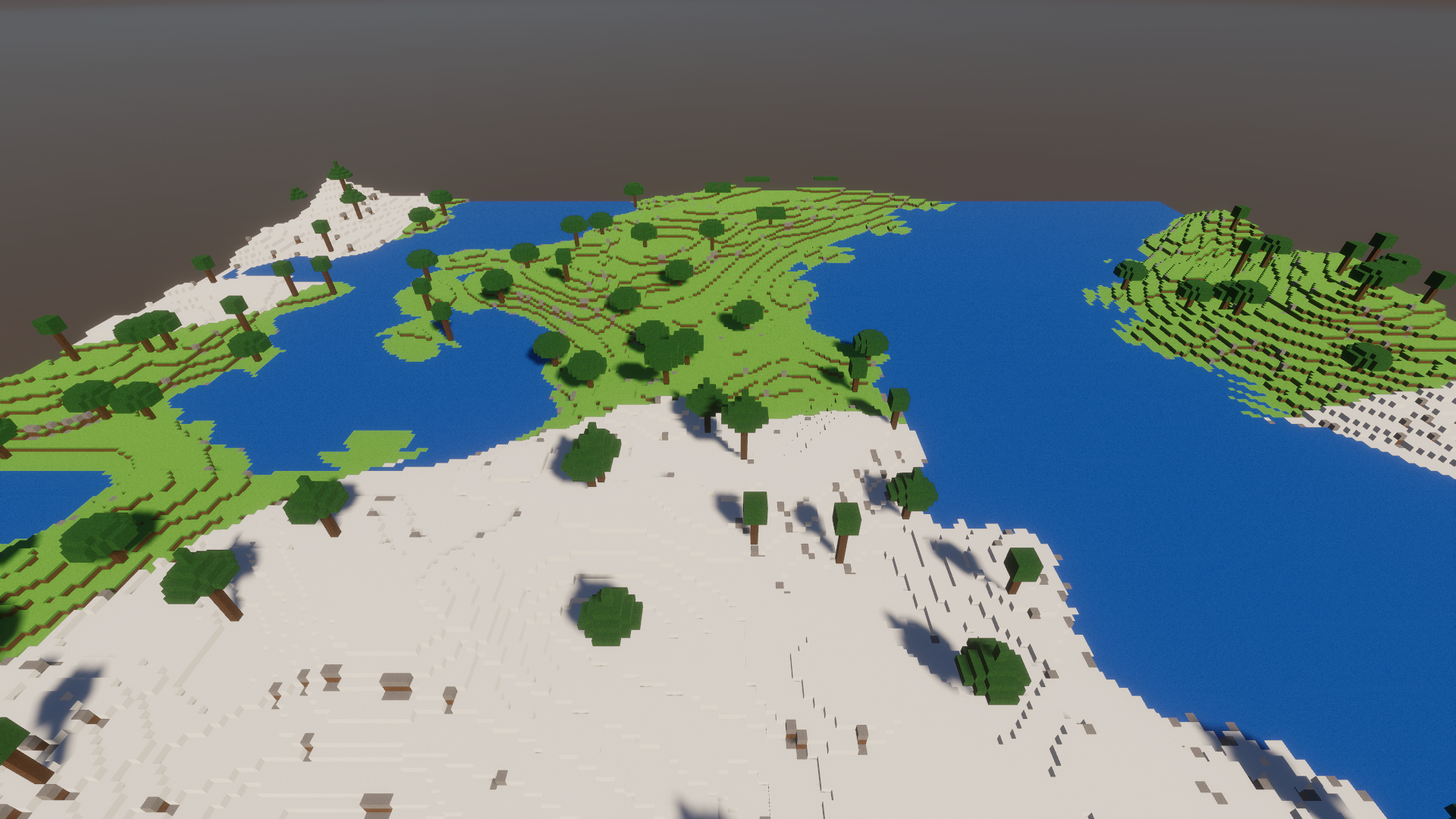 High altitude aerial perspective of mountains, rivers, and multi-biome terrain